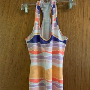 Two Lululemon tank tops.